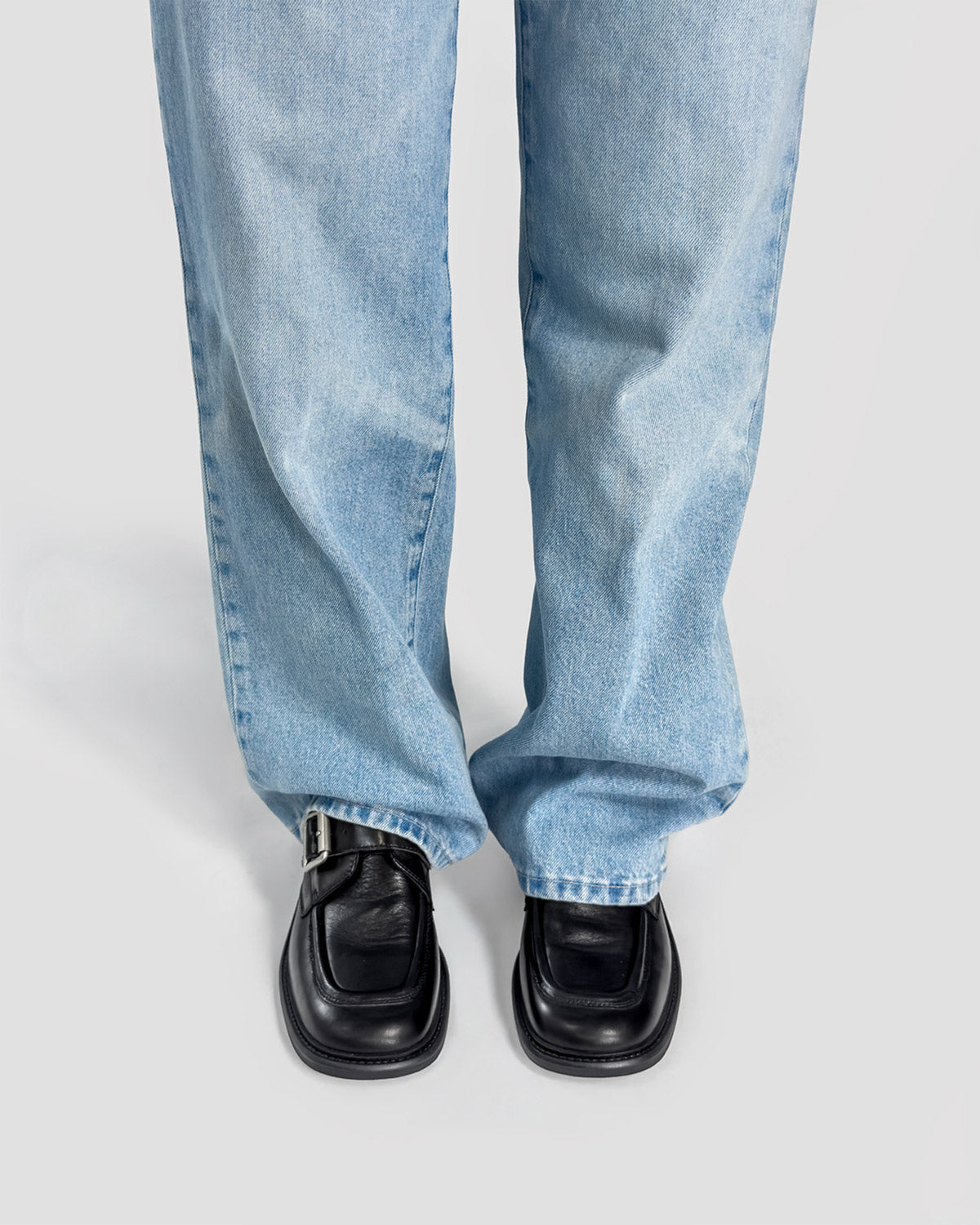 Women's black leather loafers with buckle strap comfortable and stylish