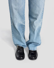 Women's black leather loafers with buckle strap comfortable and stylish