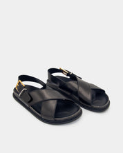 women's black leather buckle strap sandals with crossover design