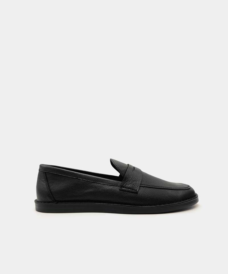Designer loafers women’s – hand-stitched black leather shoes in penny loafers style 