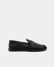 Side view of black penny loafers in leather