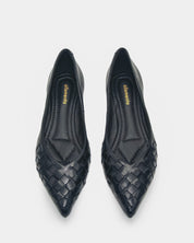 A pair of black pointed-toe flats with a woven leather pattern on the toe box, shown from a top-down view on a light gray background. The brand name 'ellementa' is visible in gold on the insoles.