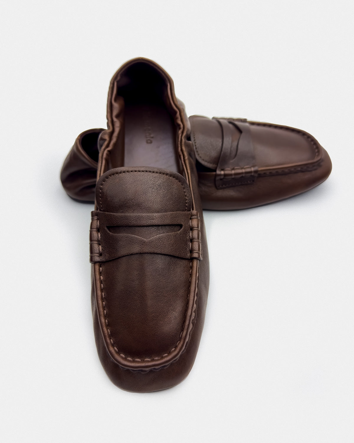 Women's dark brown leather loafers with cushioned footbed for all-day wear