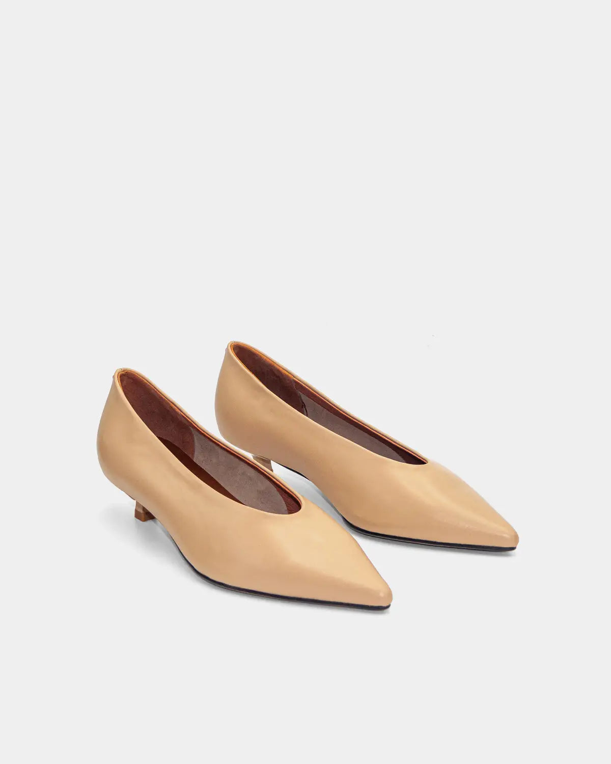Classic pointy kitten heels in timeless tan shade, made from luxurious calfskin leather for formal elegance