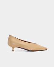 Sophisticated tan kitten heels crafted from premium calfskin leather with a delicate pointy toe design