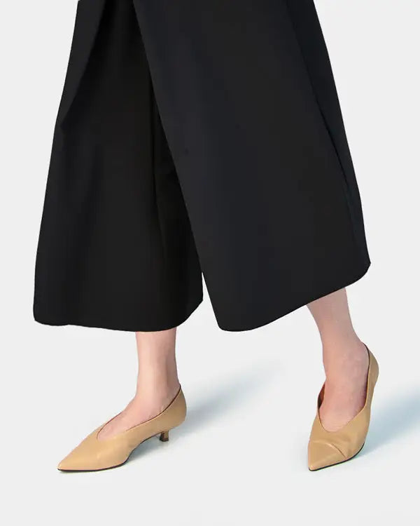 Versatile nude kitten heels shoes in soft beige calfskin, featuring a comfortable low heel for all-day wear