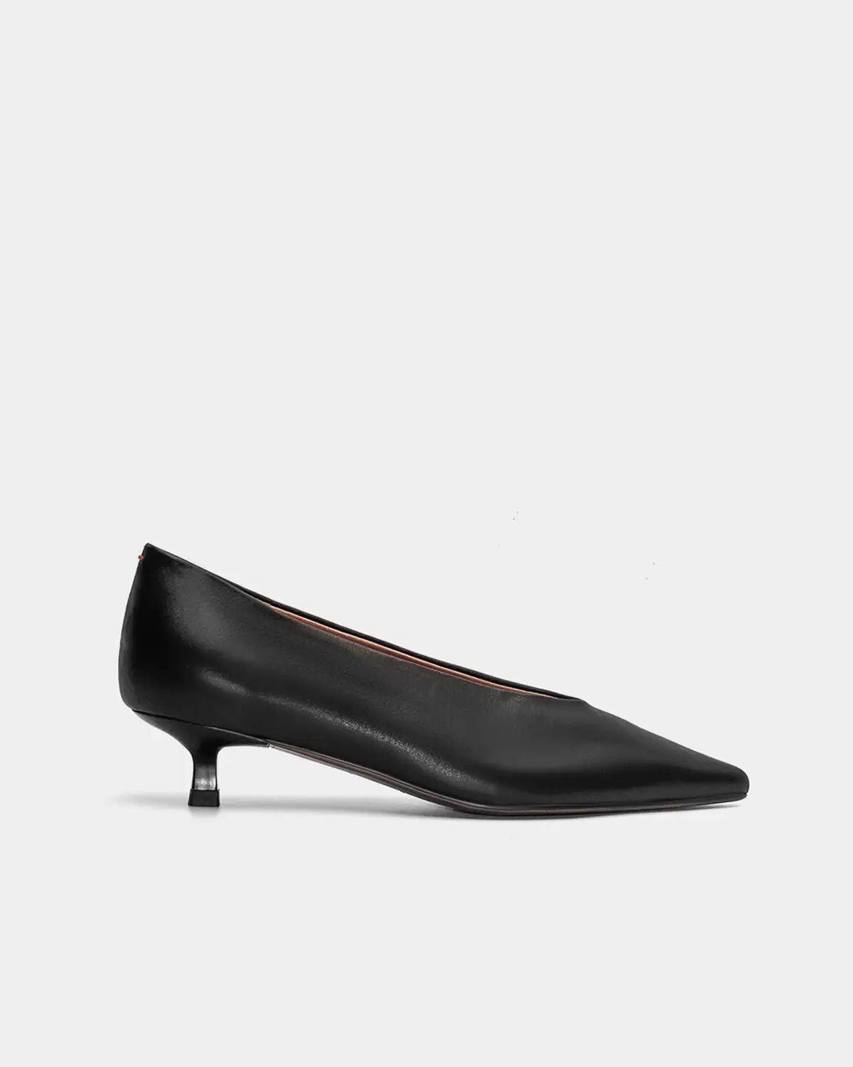 Black calfskin leather kitten heels with a pointed toe, offering timeless sophistication for work or evening wear