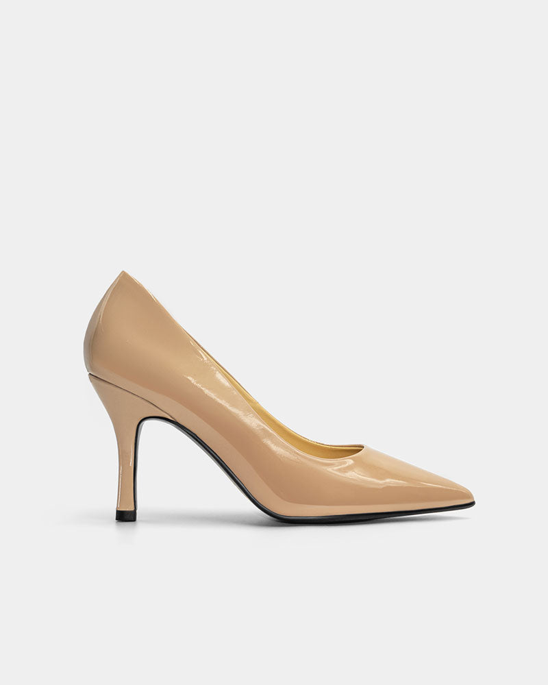 Side view of Nude patent leather comfort heels -closed toe pumps