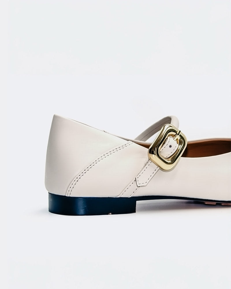 white leather Mary Jane flats with adjustable buckle strap