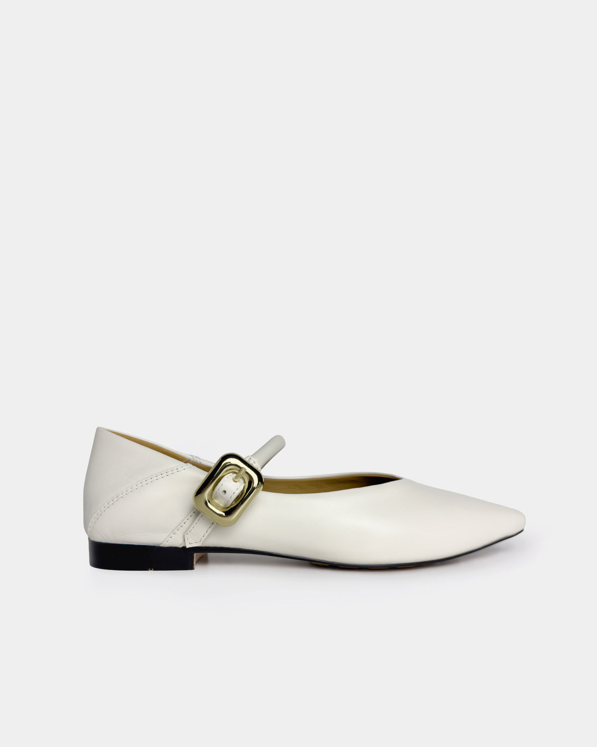 A single white leather Mary Jane flat shoe with a pointed toe and a gold-tone buckle strap, shown in profile against a solid light gray background.