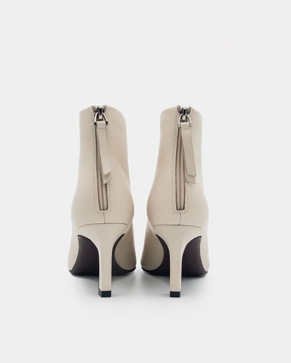 Shop women’s shoes – elegant off-white ankle boots with back zipper detail
