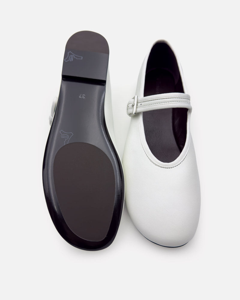 white ballet flats with slip-resistant leather outsole