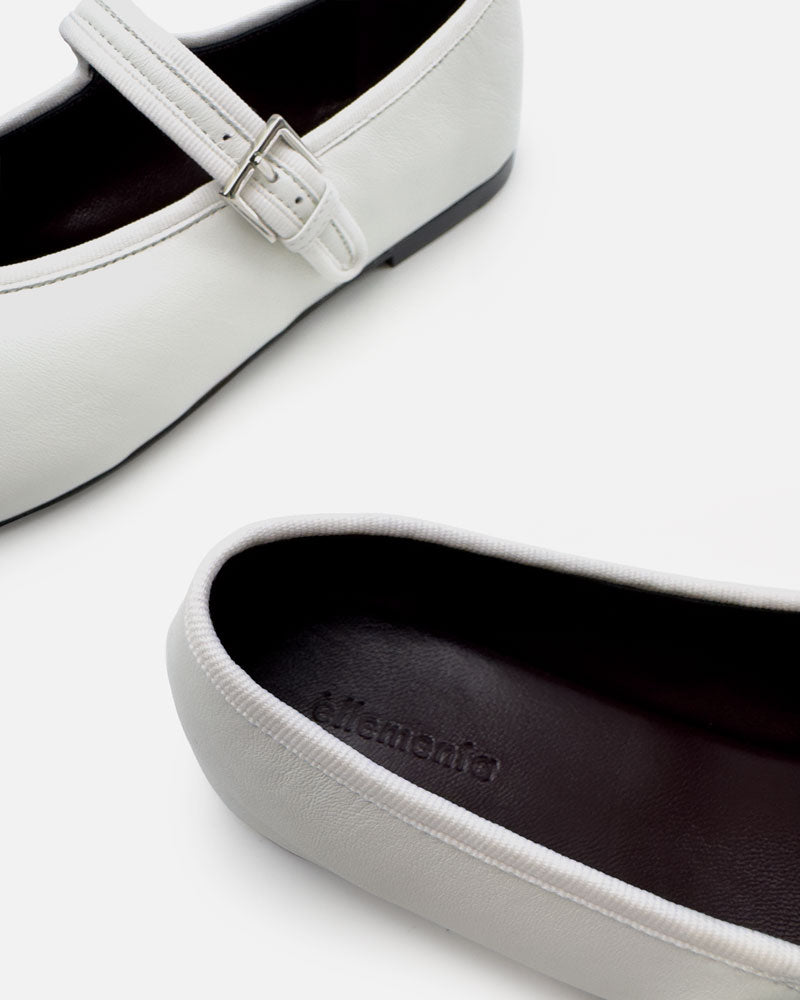 white ballet flats with soft leather lining and padded footbed