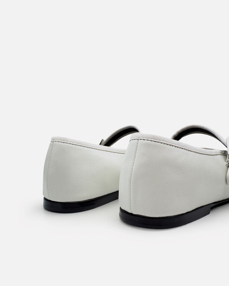 White leather ballet flats with stacked leather heel