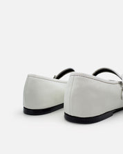 White leather ballet flats with stacked leather heel