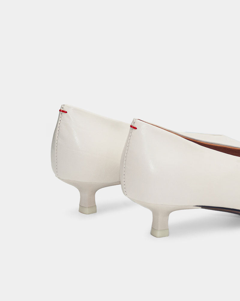 White kitten heels with balanced heel counter 
