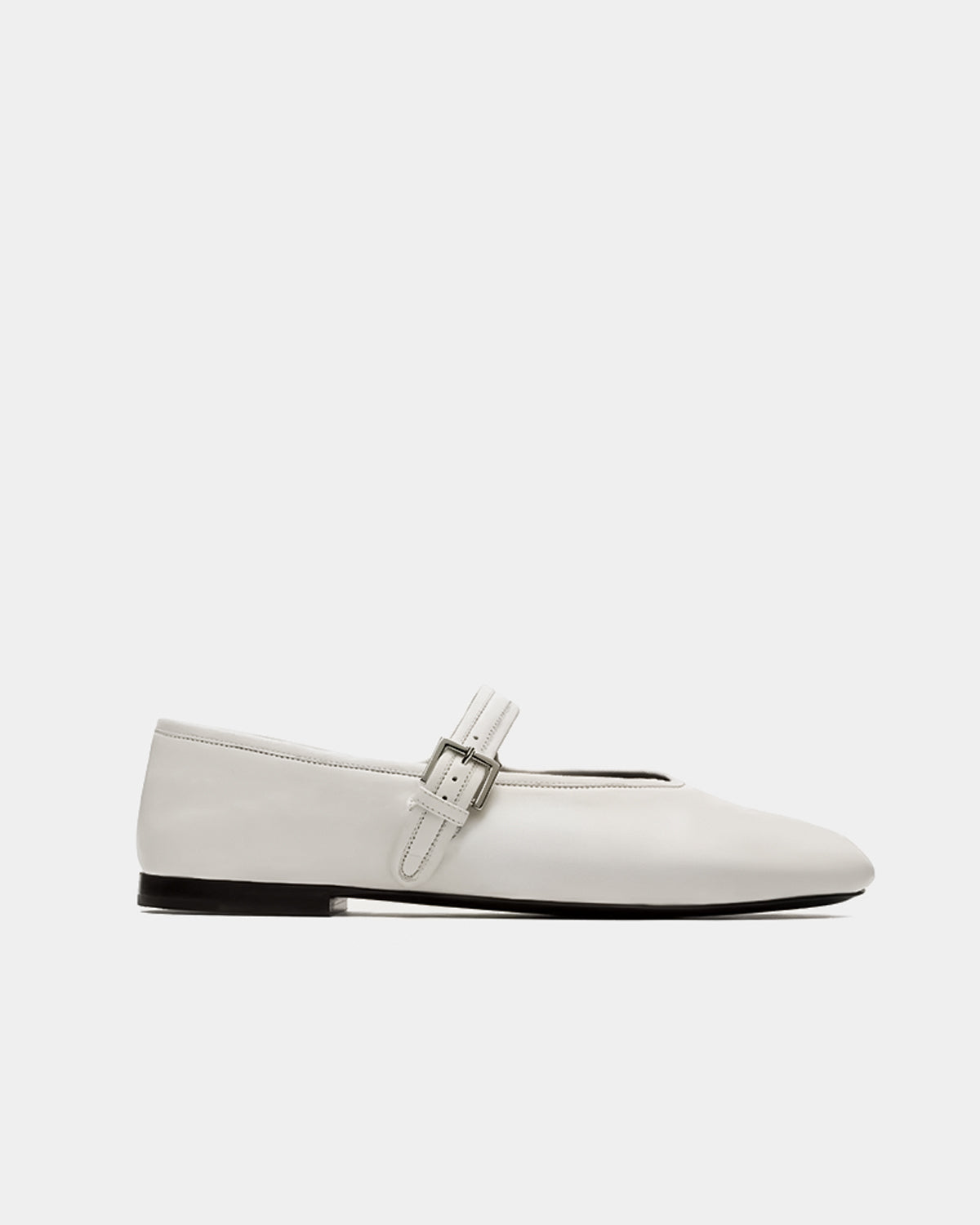 side profile white ballet flats—flexible leather sole and strap