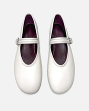 white ballet flats with cushioned leather footbed for all-day comfort