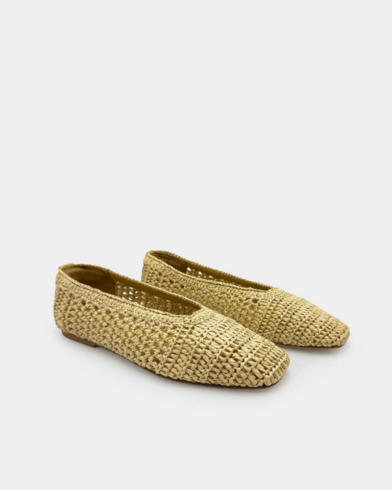 pair of natural raffia ballet flats—lightweight woven construction