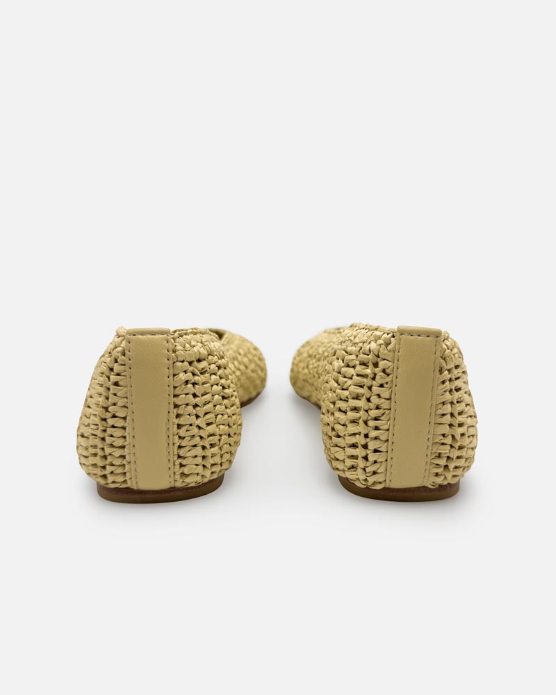 Back view of woven raffia ballet flats